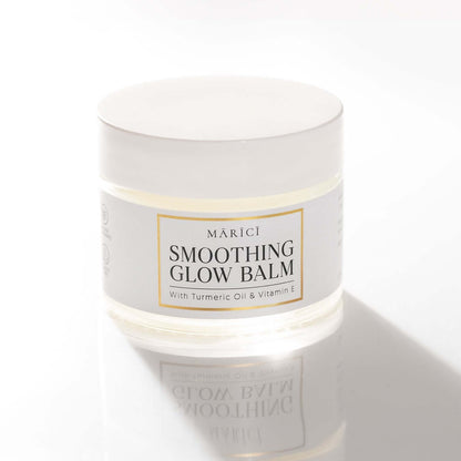 Multipurpose Smoothing Glow Balm with turmeric oil and vitamin E in a stylish jar, ideal for repairing dry skin.